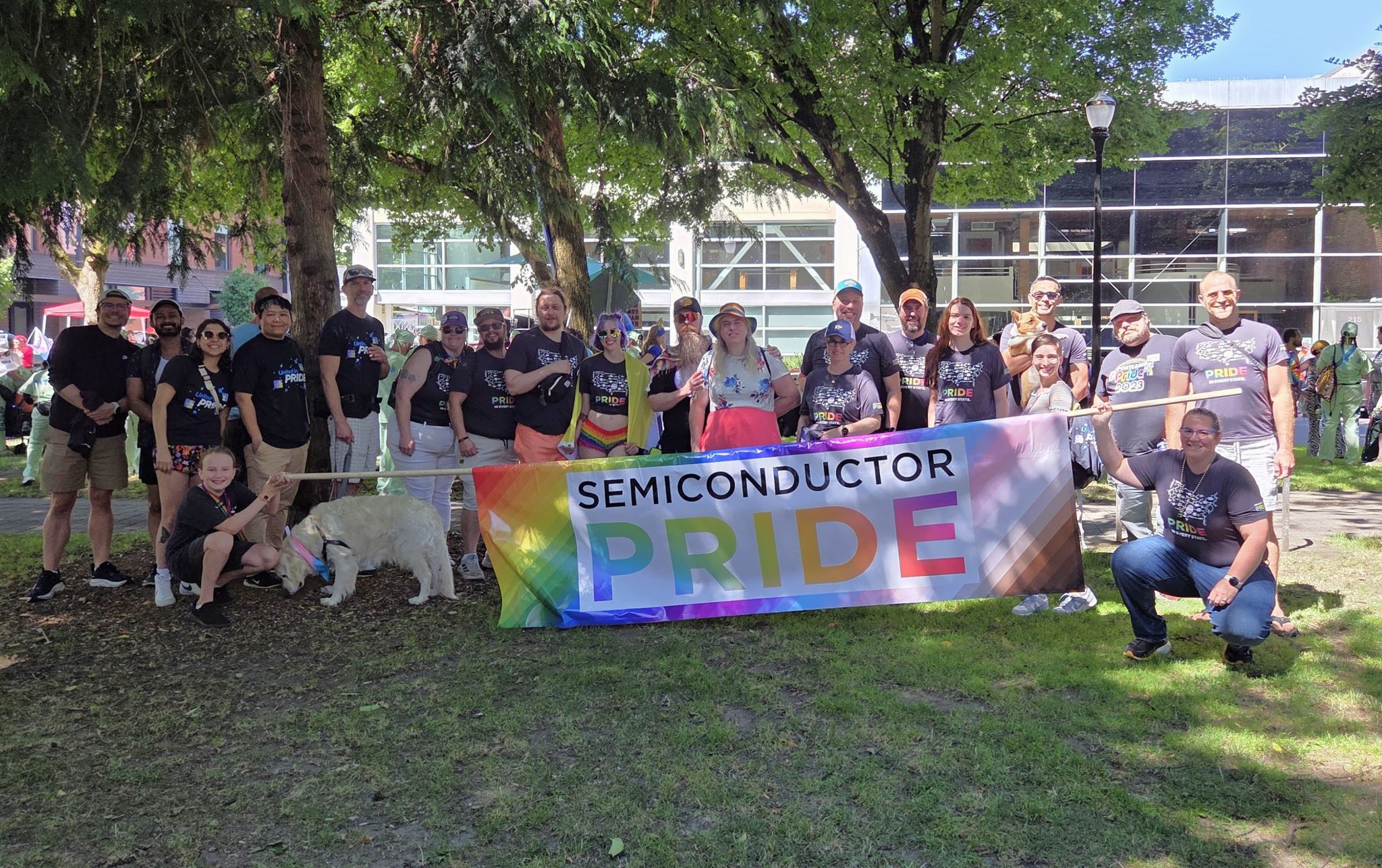 Semiconductor PRIDE members with their banner at a 2026 Pride parade