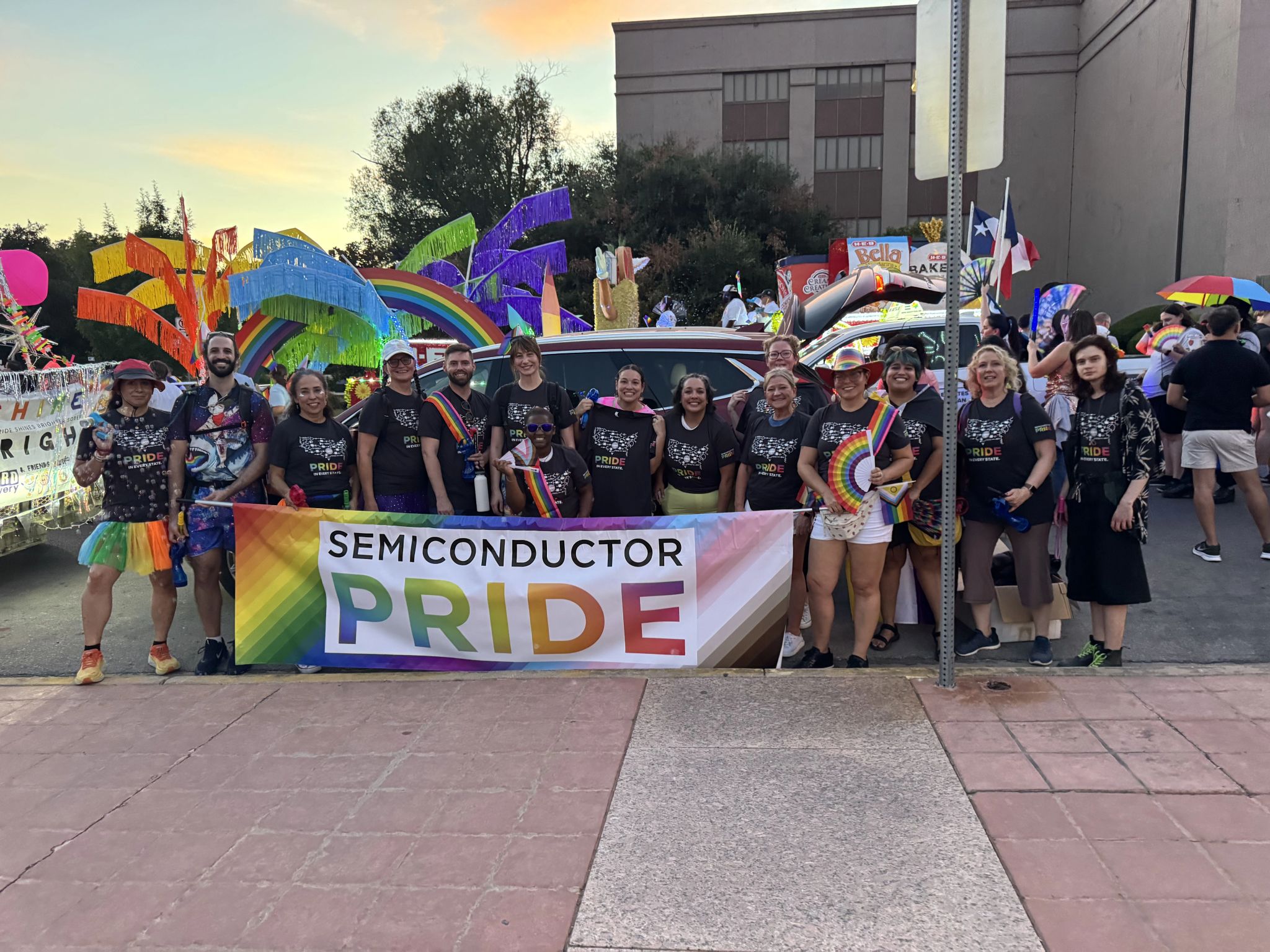 Semiconductor PRIDE members at an evening 2026 Pride parade